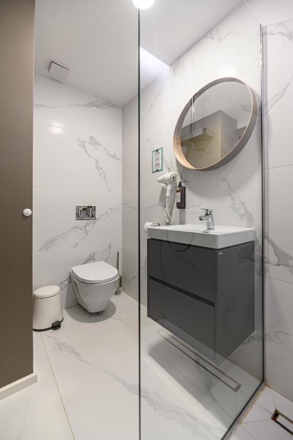 Hotel Central Pascani Bagian luar foto