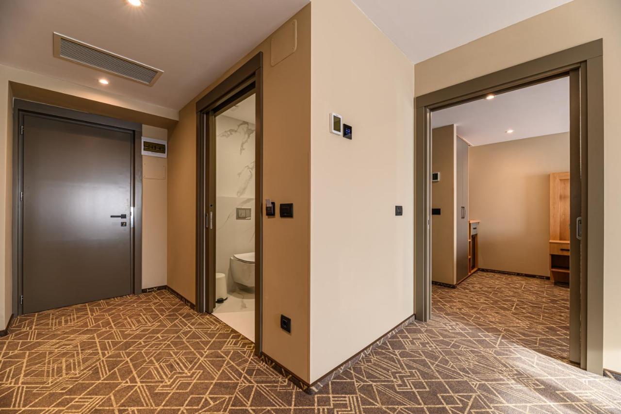 Hotel Central Pascani Bagian luar foto